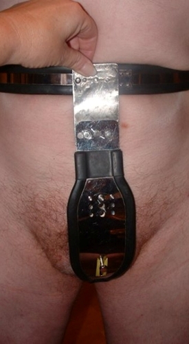 A slave wearing a chastity device